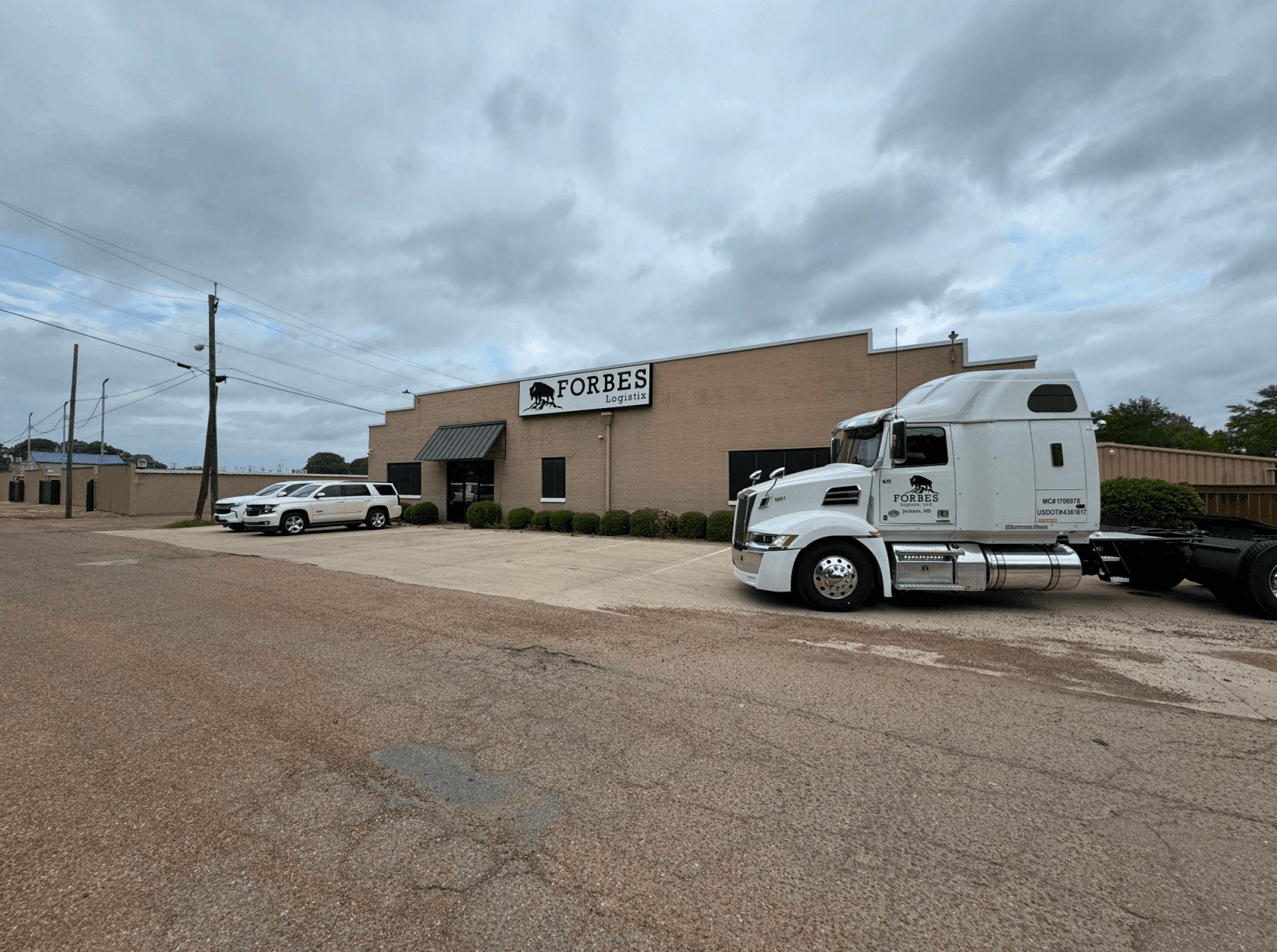 Forbes Logistix terminal in Jackson, Mississippi with company tractor parked outside